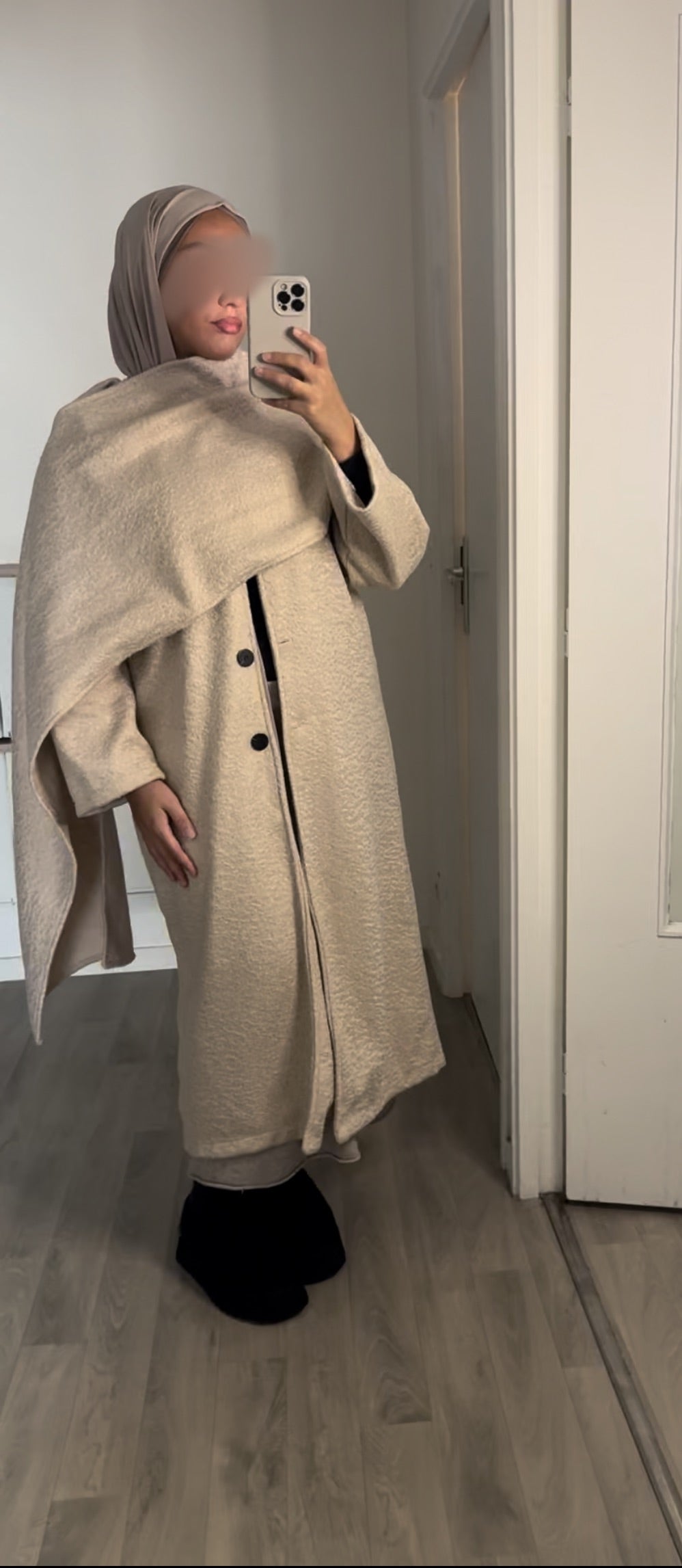 Manteau long à cape